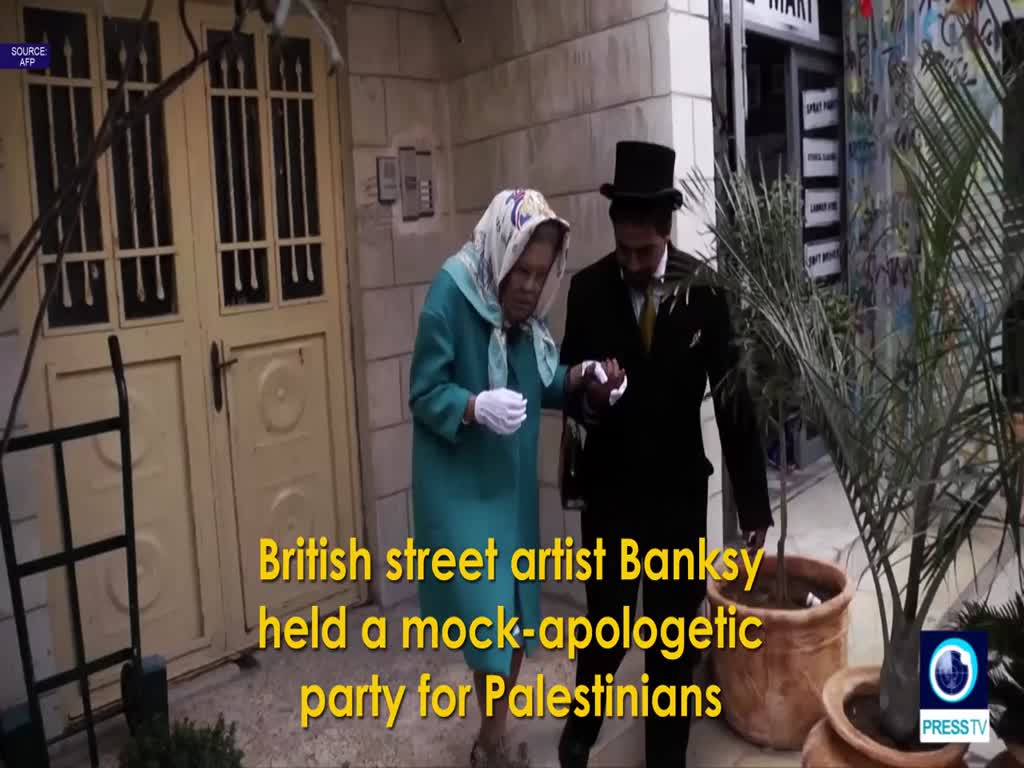 [02 November 2017] Banksy stages mock \'apology party\' to Palestinians over Britain\'s Balfour move - English