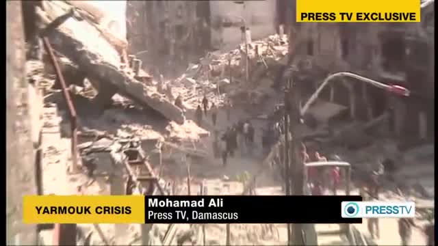 [28 Mar 2014] Exclusive: Syrian militants hindering aid distribution to Yarmouk - English