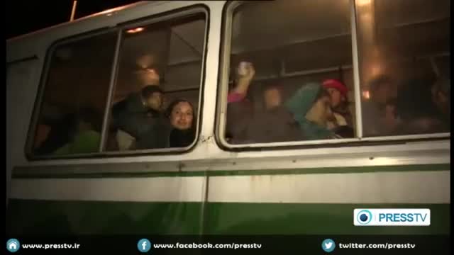 [18 Jan 2015] Syrians fleeing Takfiri militants infighting in Damascus countryside - English