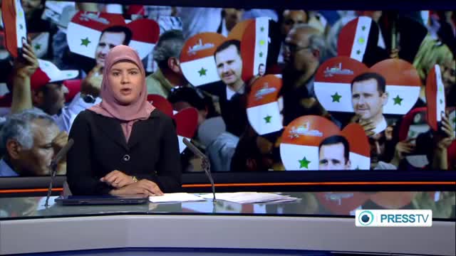[22 May 2014] Exclusive: Thousands of Syrians rally in Idlib to support army, President Assad - English
