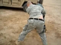 Soldier gets tossed by an Iraqi while wrestling - All languages