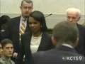 PROTESTER CONDOLEEZZA RICE YOU HAVE BLOOD ON YOUR HANDS - English