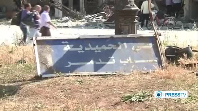 [11 May 2014] Syrian army comb old Homs districts - English