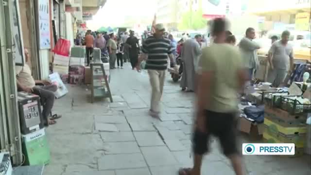 [18 July 2014] Iraqis live normal life under shadow of terrorism - English