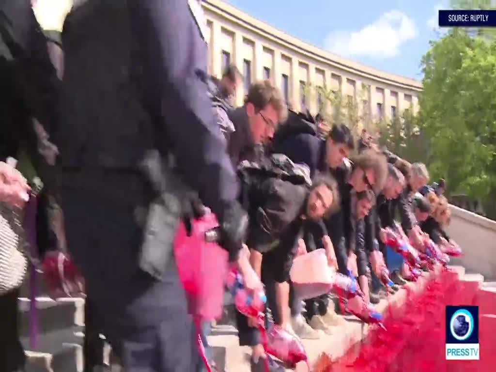 [13 May 2019] French activists paint steps of the Trocadero with \'BLOOD\' of extinct animals - English